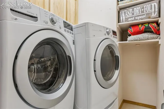 a utility room with dryer and washer