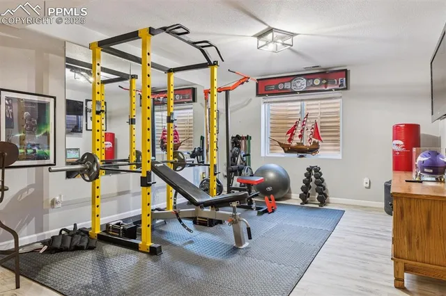 a view of a room with gym equipment