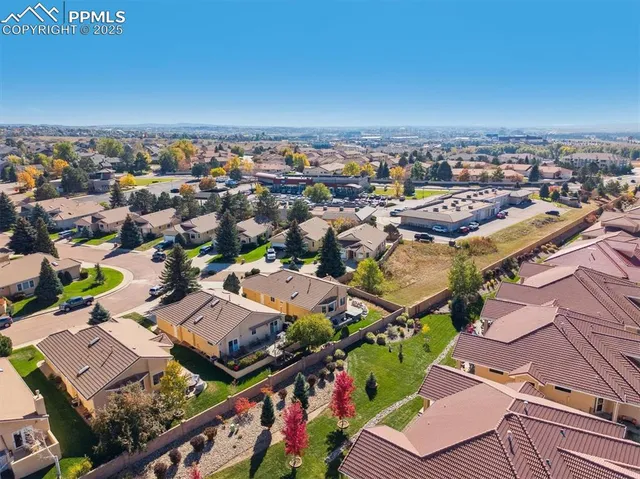 an aerial view of a city with lots of residential buildings