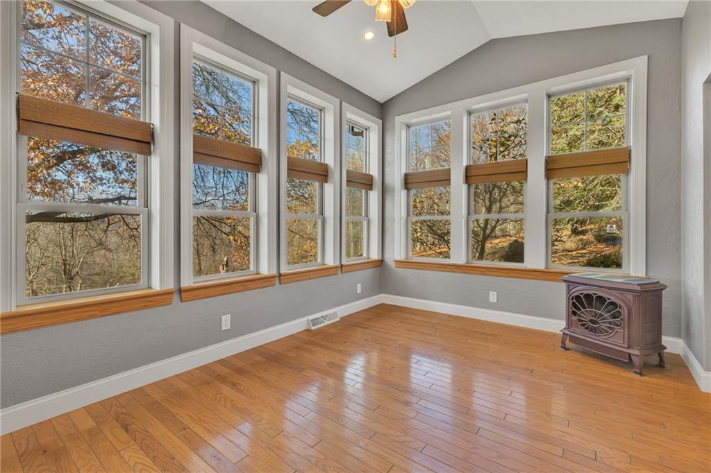 685 Old Ridge Road Avella, PA 15312 - Photo 6 of 50 a view of an empty room with a window and wooden floor