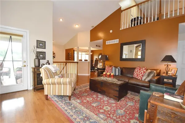 a living room with furniture and a table
