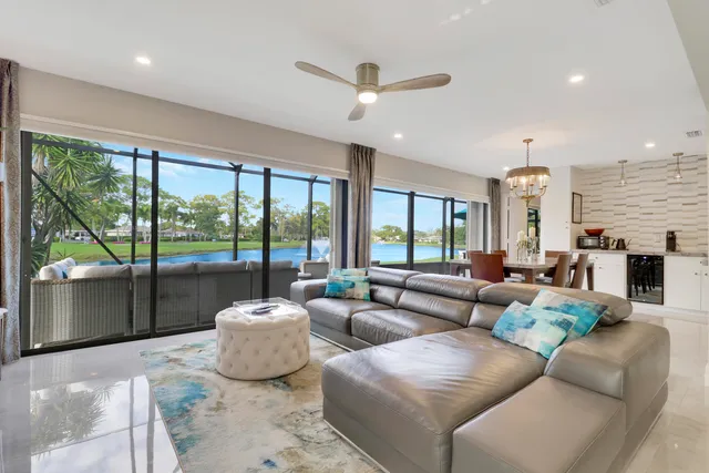 a bedroom with a large bed and a large window