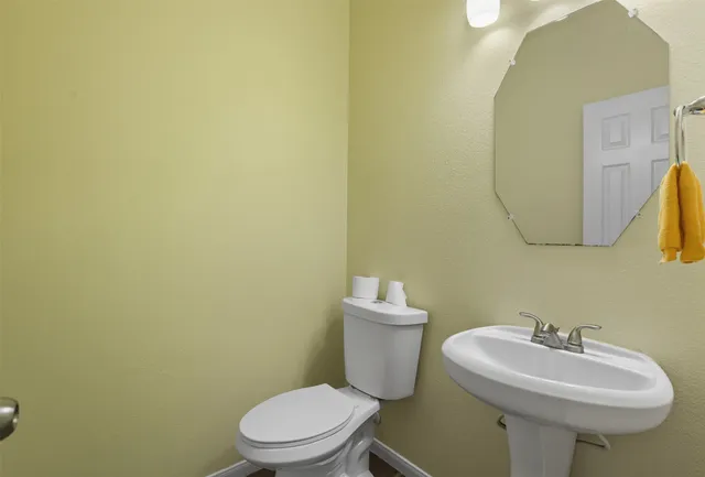 a bathroom with a sink and a toilet