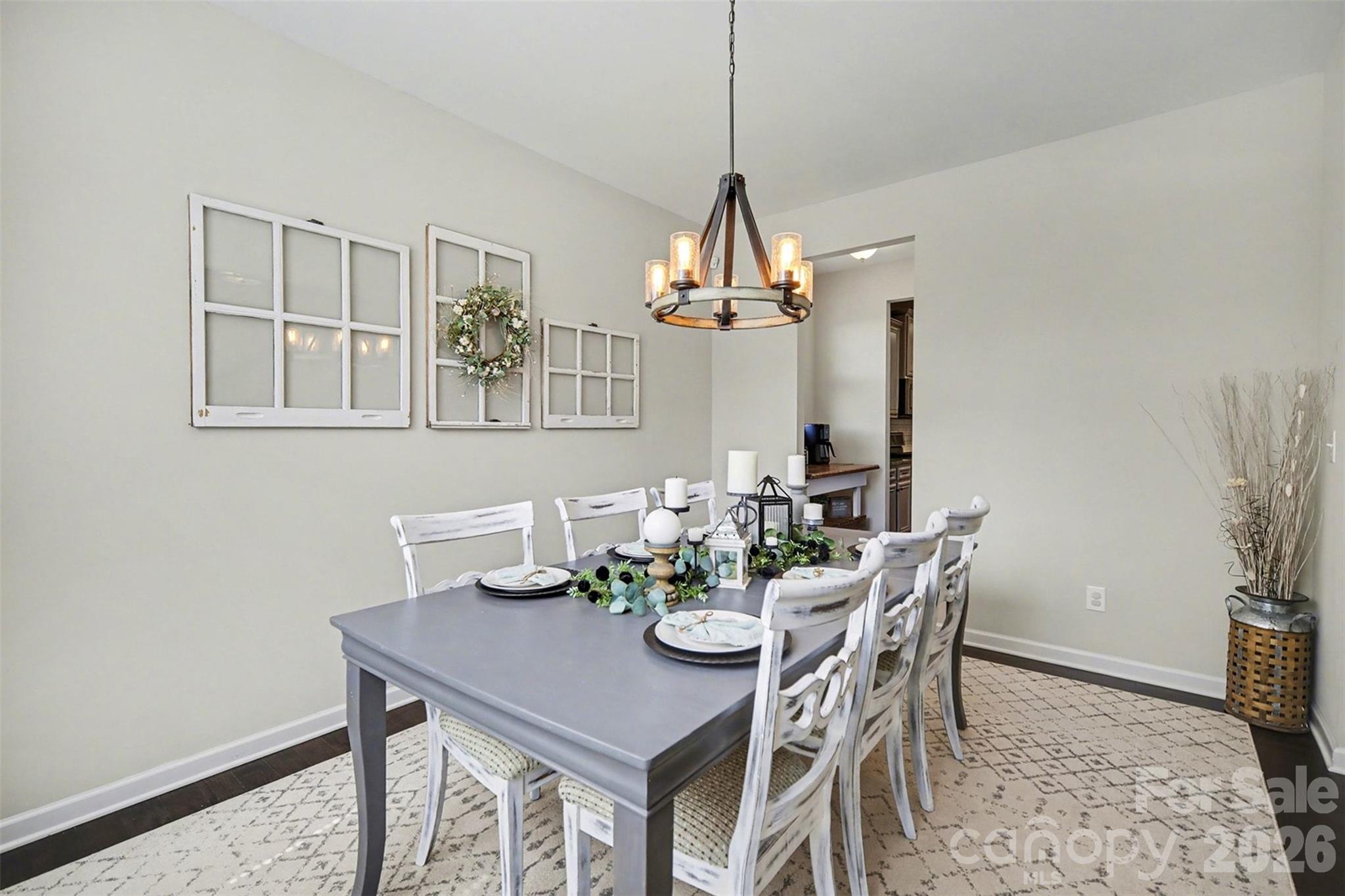 514 Tack Lane Midland, NC 28107 - Photo 4 of 48 a view of a dining room with furniture and wooden floor