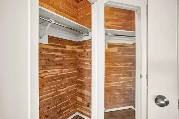 a bathroom with a glass door shower