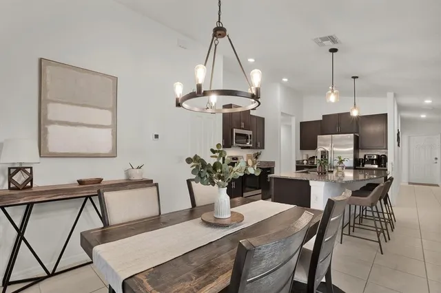 a view of a dining room with furniture