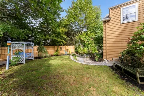 a view of a back yard of the house
