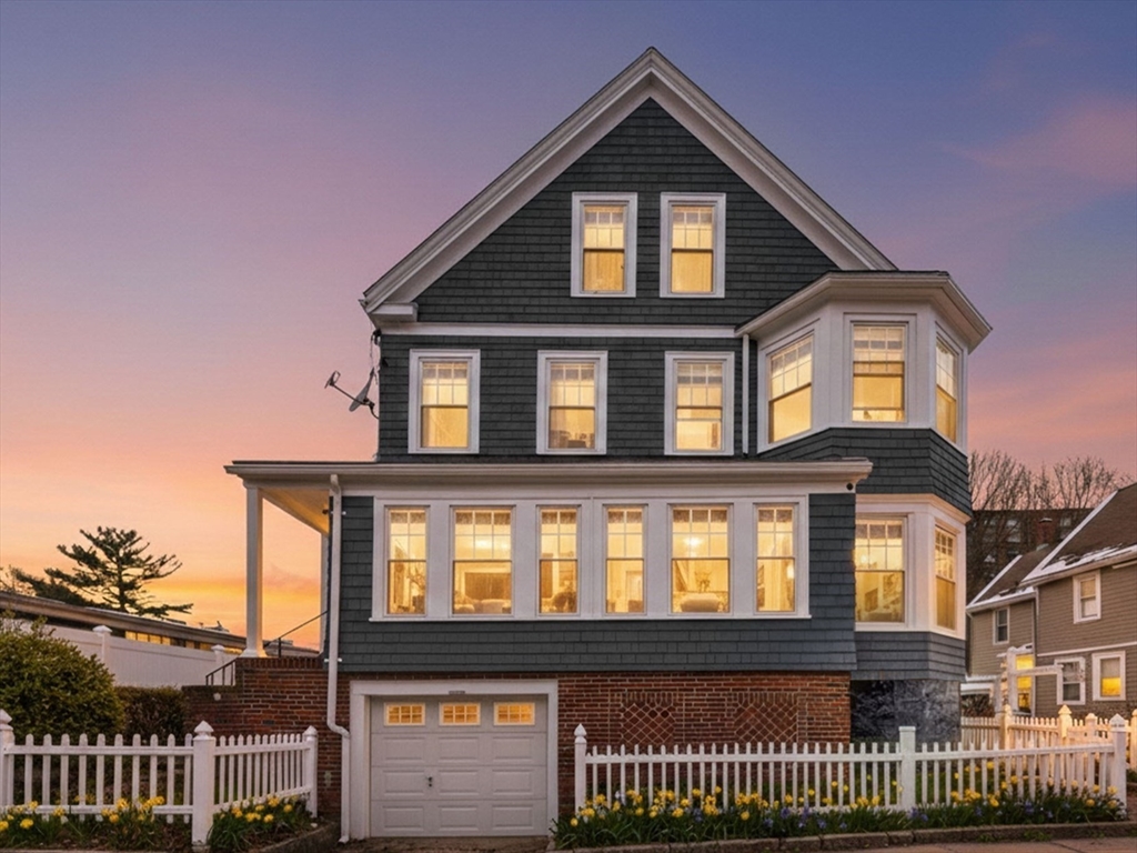 87 Burt Street Boston, MA 02124 - Photo 3 of 40 a front view of a house with a yard