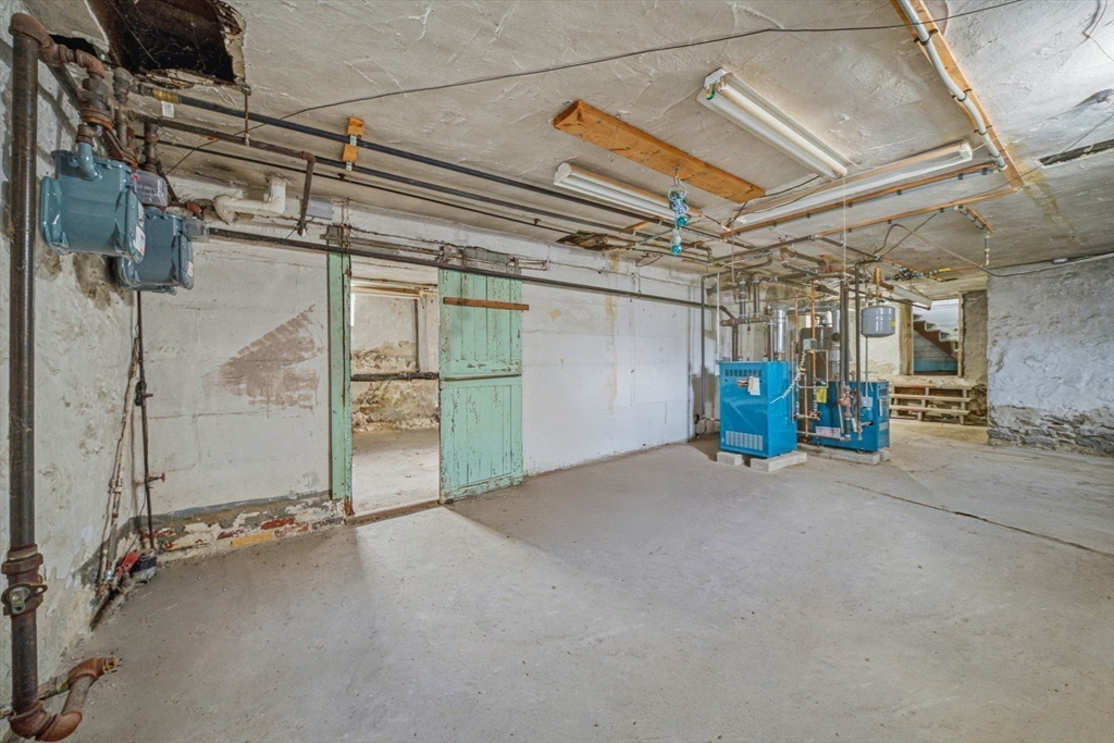 87 Burt Street Boston, MA 02124 - Photo 36 of 40 a view of a room with wooden walls
