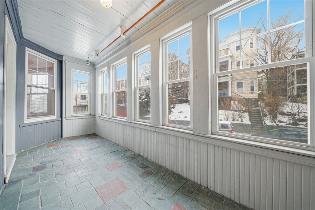 87 Burt Street Boston, MA 02124 - Photo 5 of 40 a view of an empty room with a window