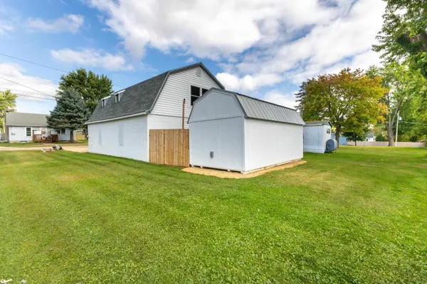 a view of a room with furniture and a garage