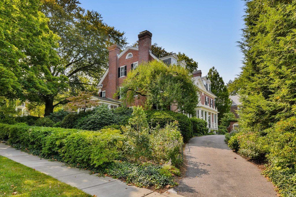 337 Buckminster Road Brookline, MA 02445 - Photo 20 of 22 a backyard of a house with a yard and outdoor seating