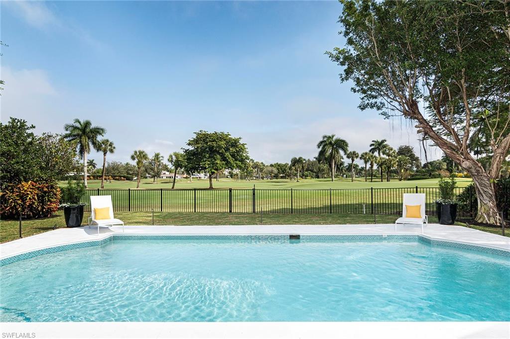 2728 Crayton Road Naples, FL 34103 - Photo 12 of 14 a view of swimming pool