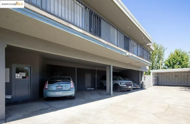 a view of car parked in front of building