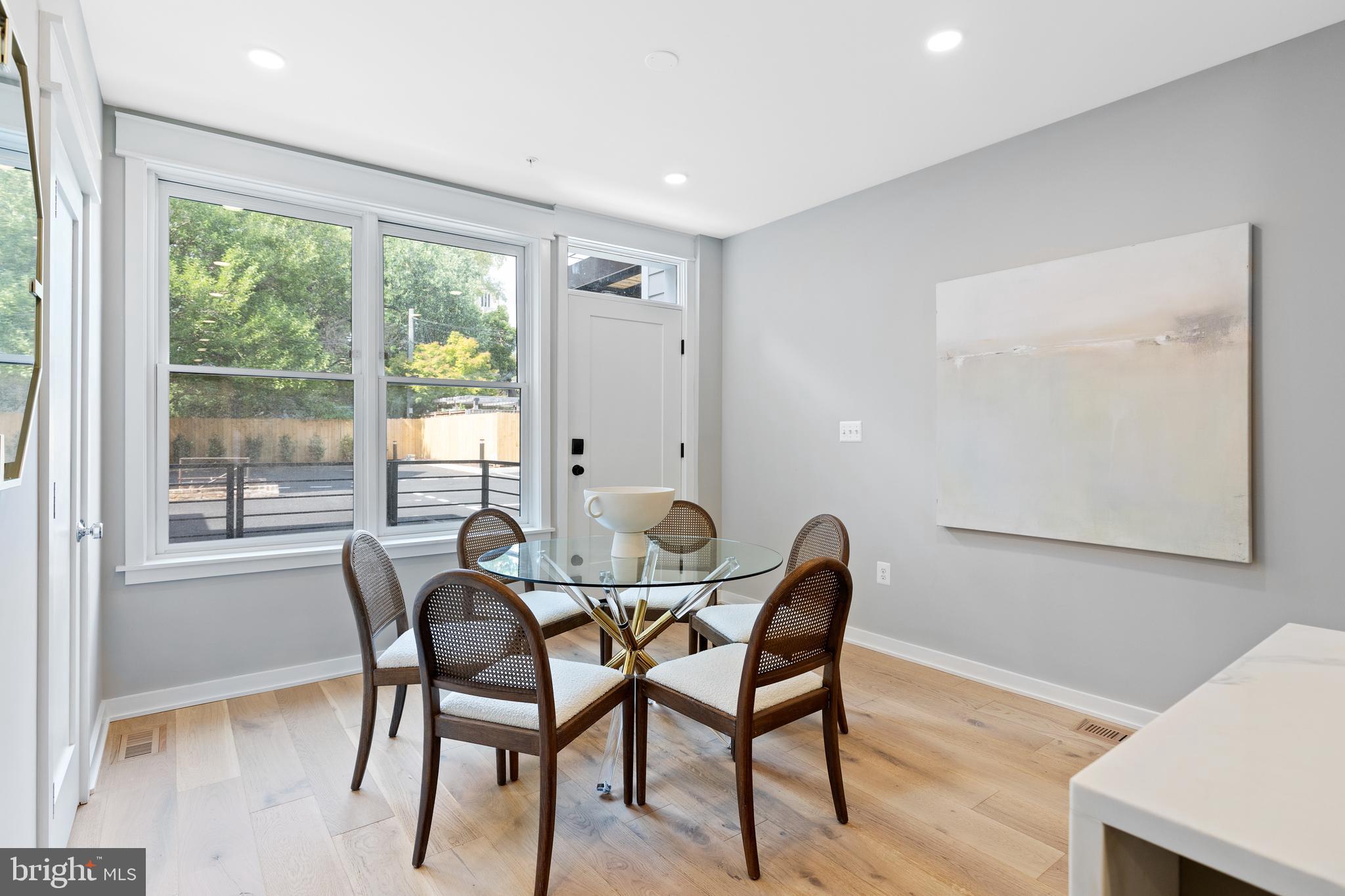 406 D Street Southeast Washington, DC 20003 - Photo 11 of 39 a view of a dining room with furniture and wooden floor
