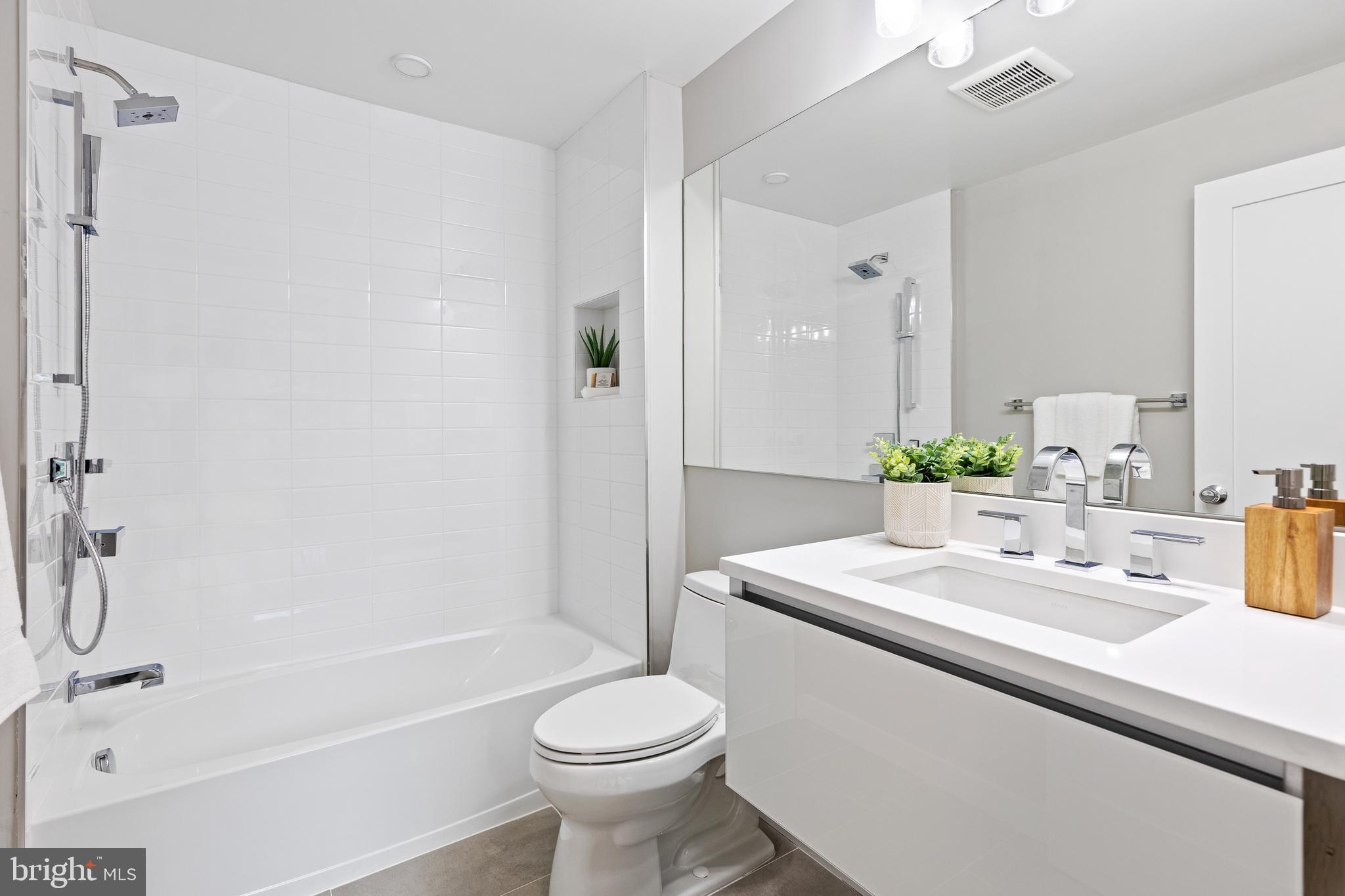 406 D Street Southeast Washington, DC 20003 - Photo 32 of 39 a bathroom with a sink toilet and shower