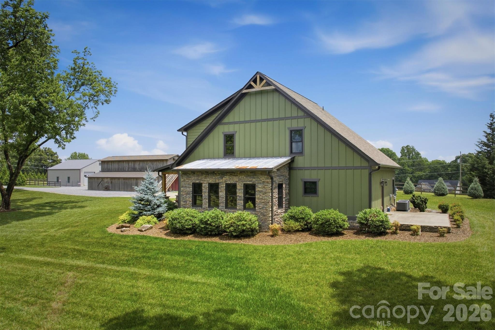 7490 Oak Ridge Church Road Connelly Springs, NC 28612 - Photo 33 of 44 a front view of house with yard and green space