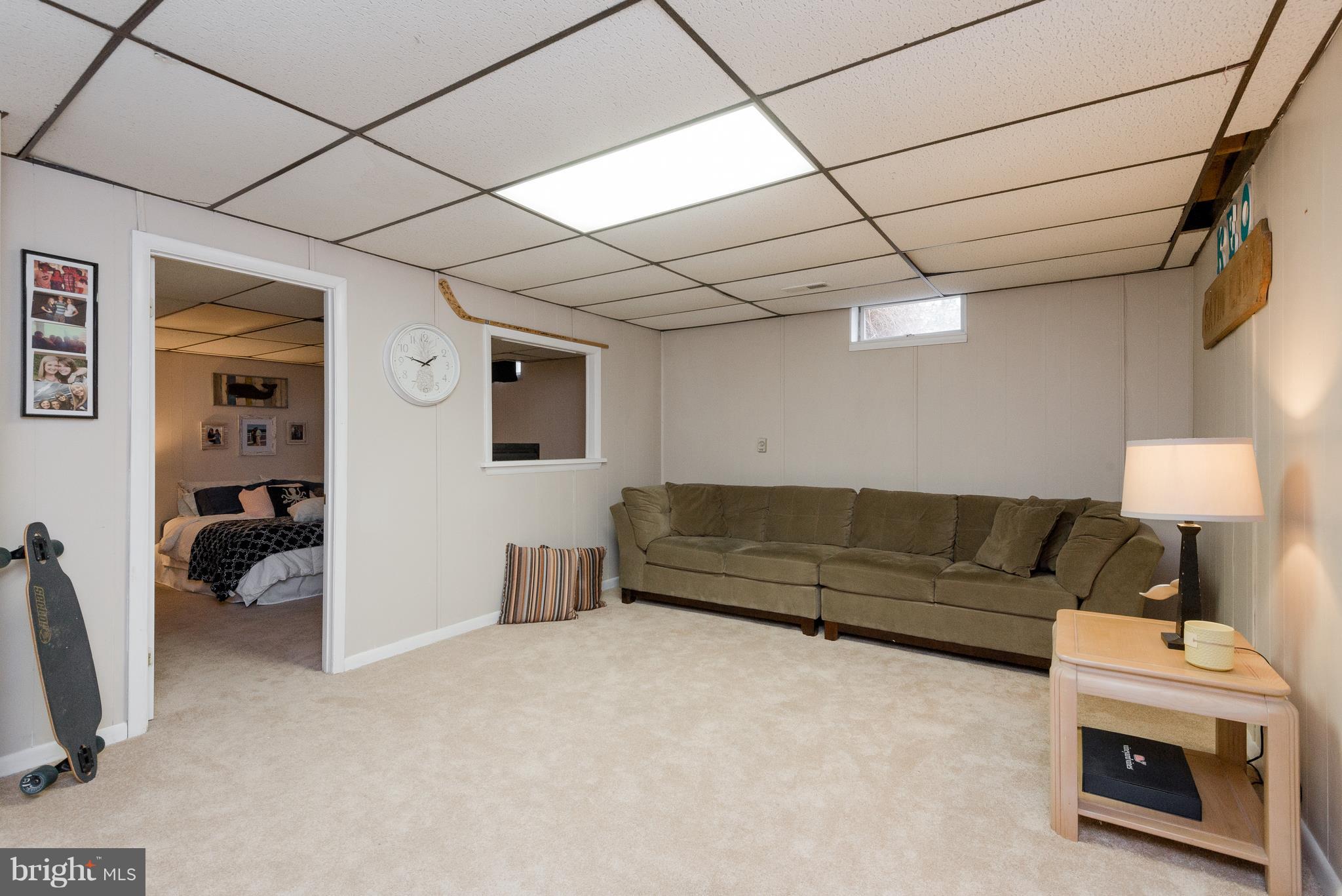 7891 Whites Cove Road Pasadena, MD 21122 - Photo 30 of 39 Lower Level Recreation Room
