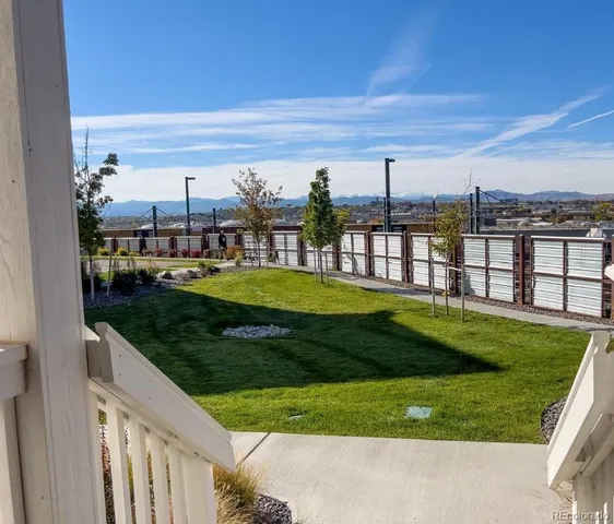 a view of a swimming pool with a garden