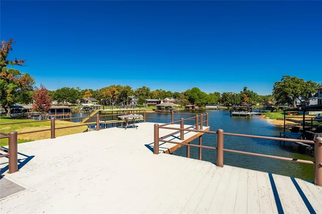 a view of swimming pool with outdoor seating