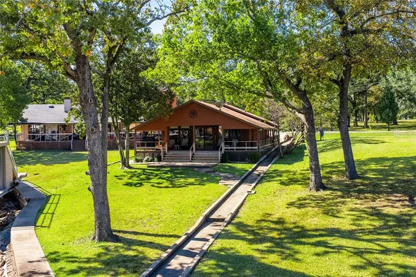 a view of a house with swimming pool