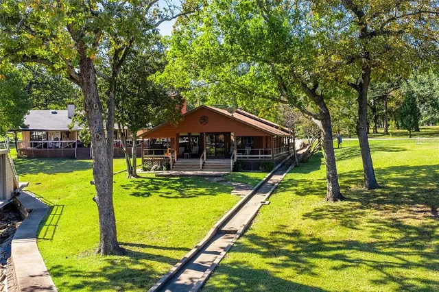 a view of a house with swimming pool