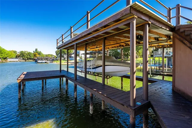 a balcony view with a seating space