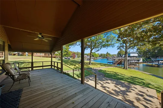 a view of a swimming pool with a patio