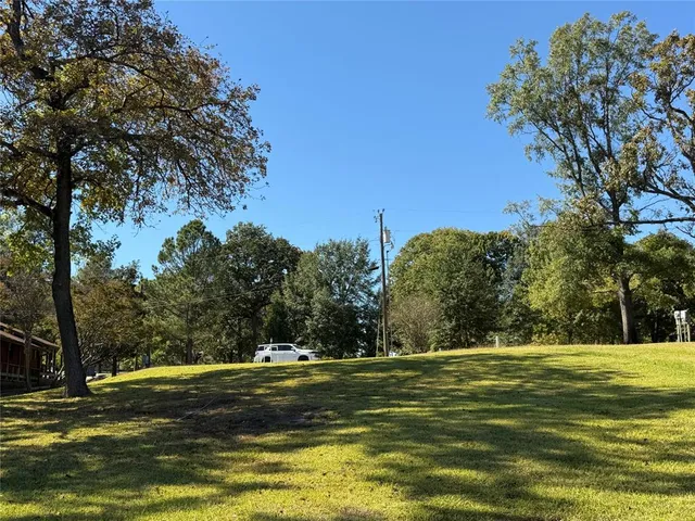 a view of a swimming pool with an outdoor space