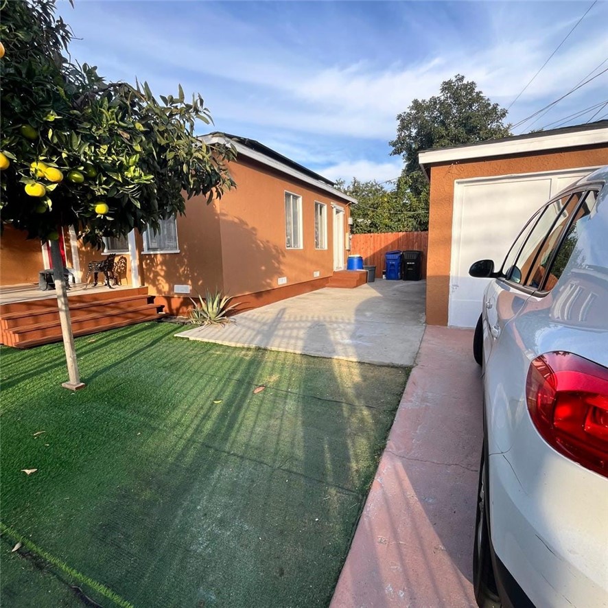 2102 East Lucien Street Compton, CA 90222 - Photo 2 of 10 a view of a backyard with a patio
