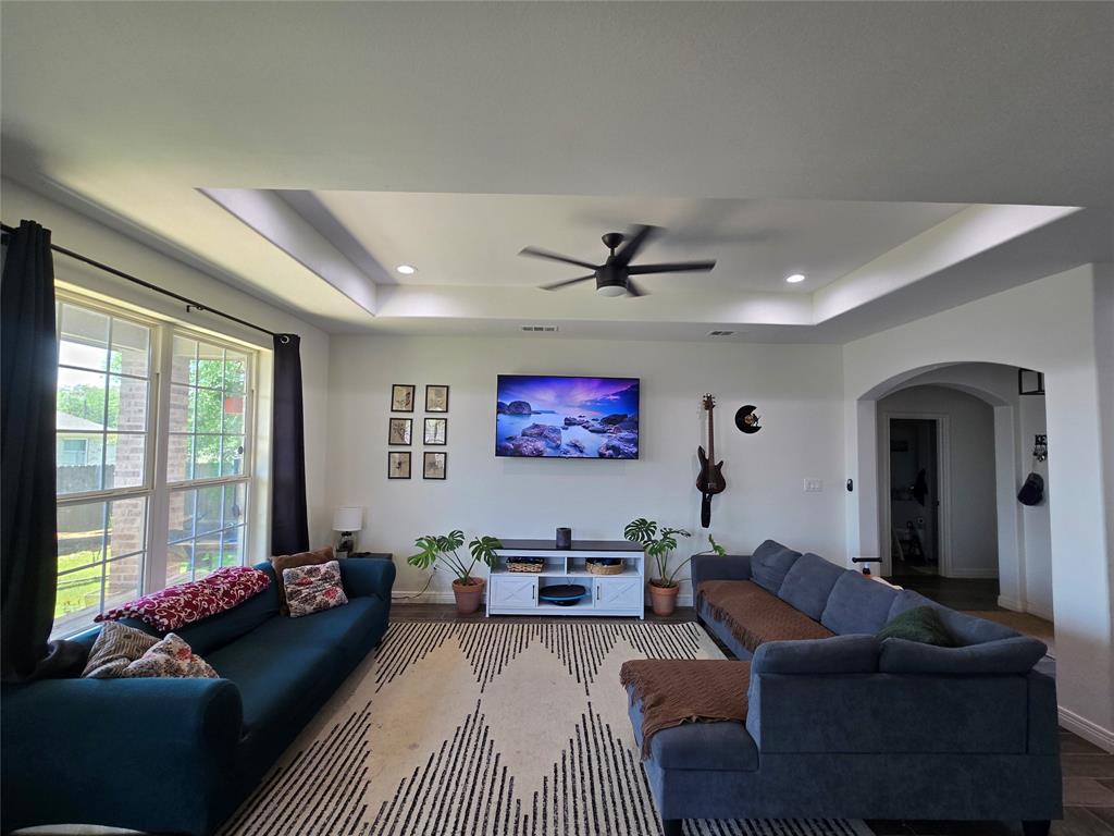 109 Baker Street Mount Vernon, TX 75457 - Photo 6 of 23 a living room with furniture and a large window