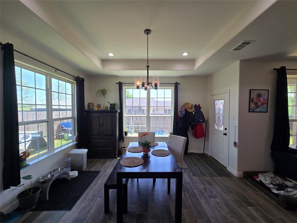 109 Baker Street Mount Vernon, TX 75457 - Photo 7 of 23 a living room with furniture and a flat screen tv