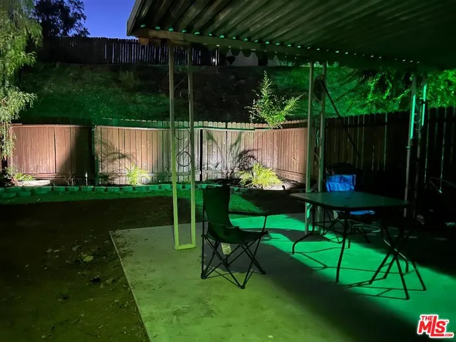 a view of a bench in the garden