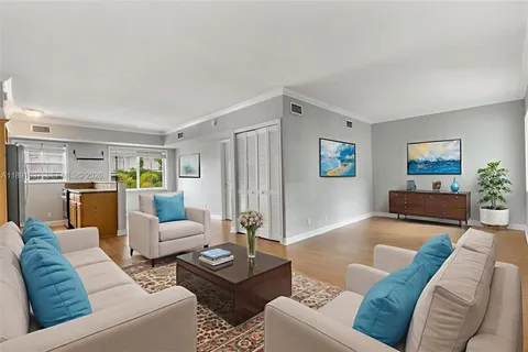 a living room with furniture and a couch