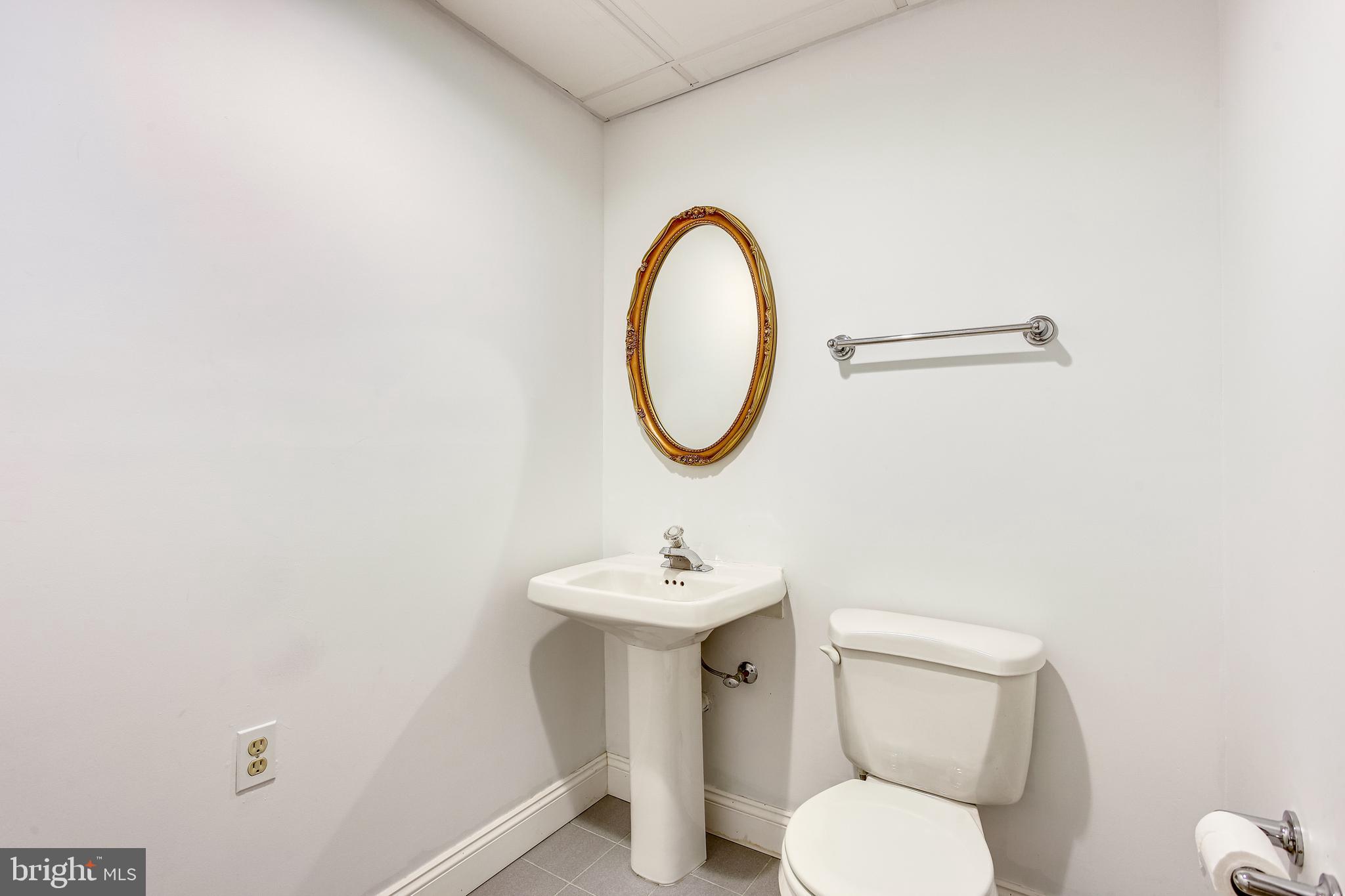10432 Stansfield Road Laurel, MD 20723 - Photo 28 of 32 Half bathroom on lower level