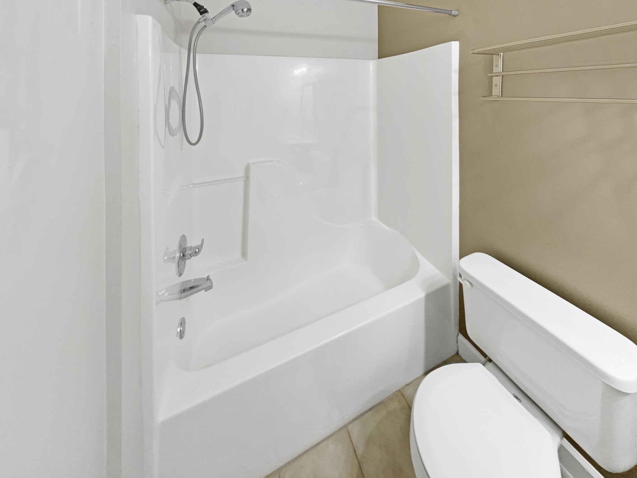 802 Riata Court Smyrna, TN 37167 - Photo 12 of 16 a bathroom with a bathtub and a toilet