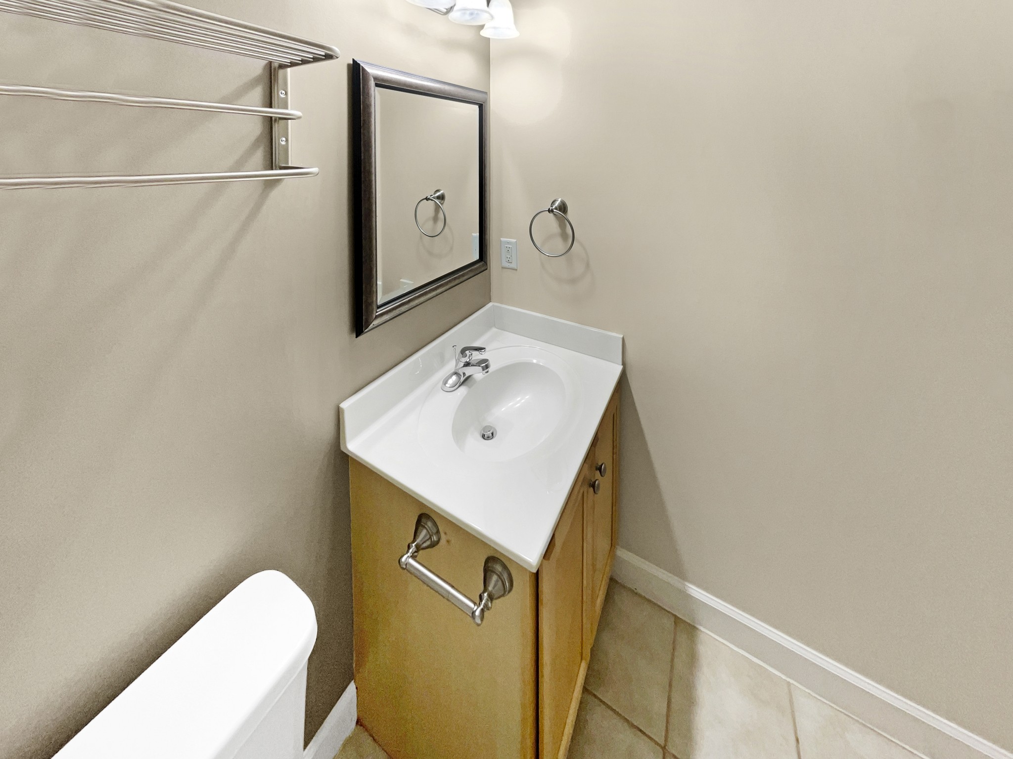 802 Riata Court Smyrna, TN 37167 - Photo 13 of 16 a bathroom with a sink and mirror