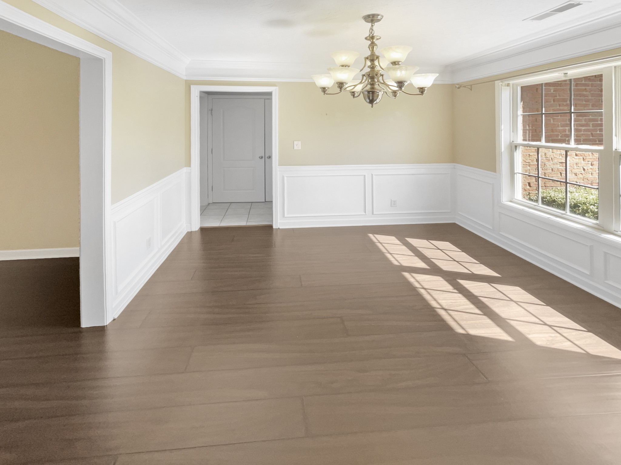 802 Riata Court Smyrna, TN 37167 - Photo 5 of 16 a view of an empty room with wooden floor and a window