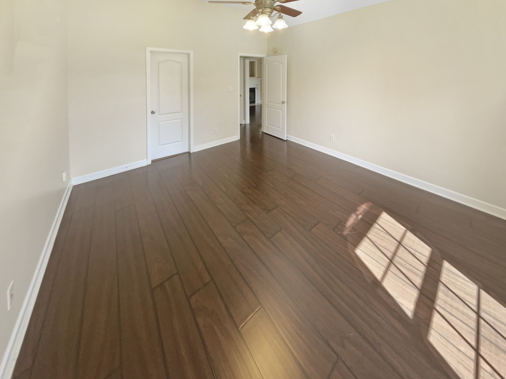 802 Riata Court Smyrna, TN 37167 - Photo 7 of 16 wooden floor in an empty room with a window