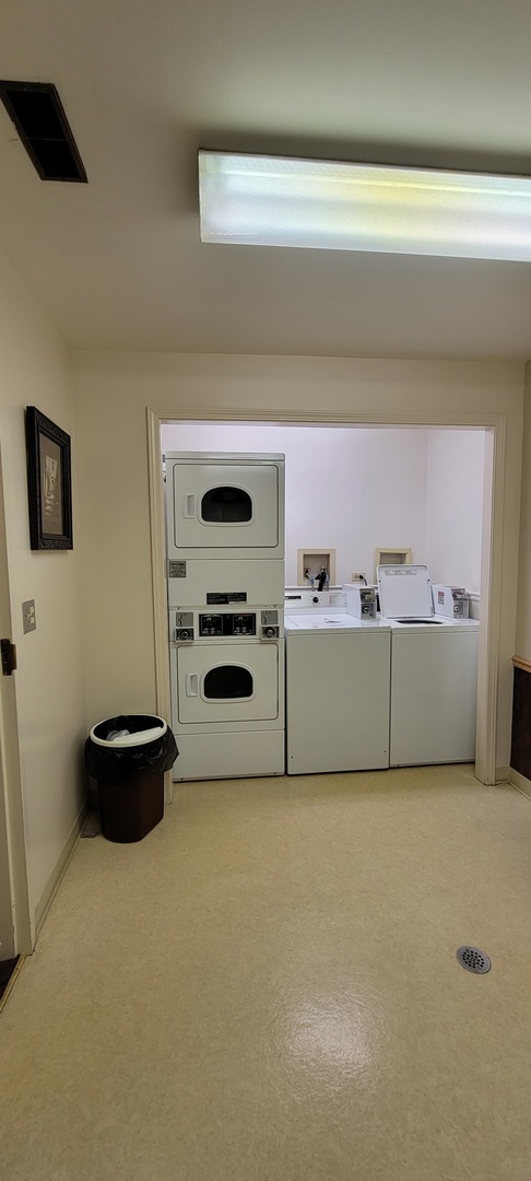 1-s150 Spring Road, Unit 5C Oak Brook, IL 60181 - Photo 12 of 12 a view of kitchen cabinets and black appliances