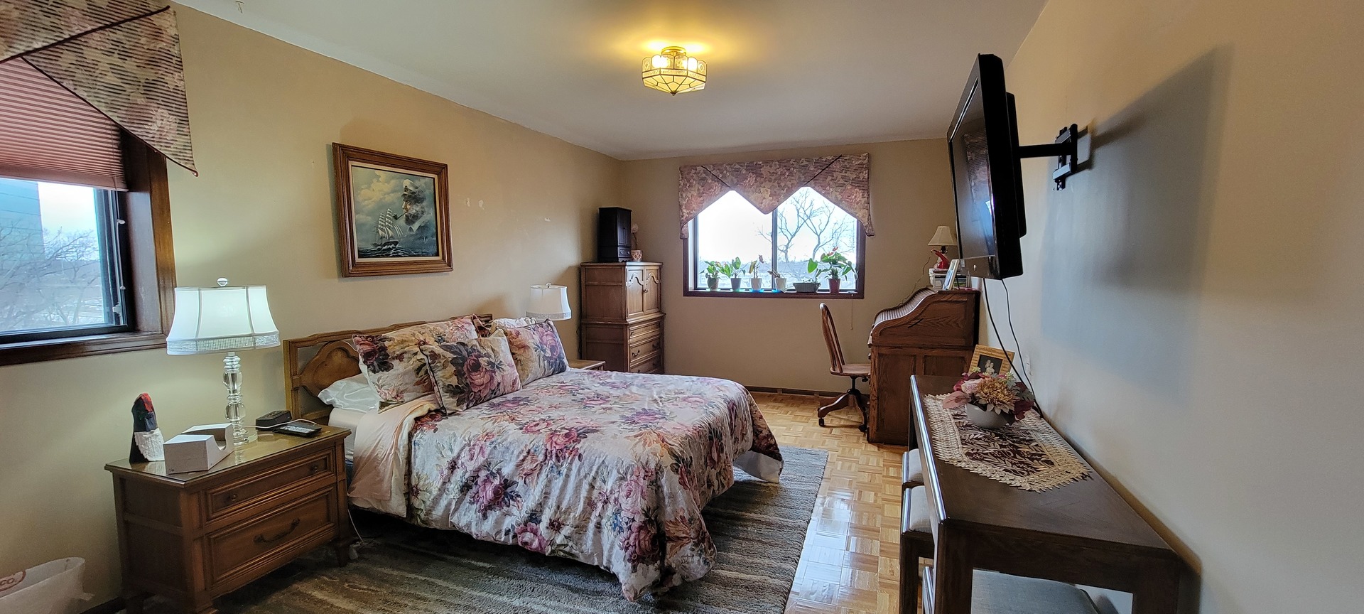 1-s150 Spring Road, Unit 5C Oak Brook, IL 60181 - Photo 7 of 12 a bedroom with a bed and a window