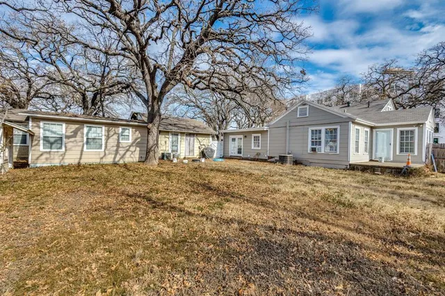 front view of a house with a small yard