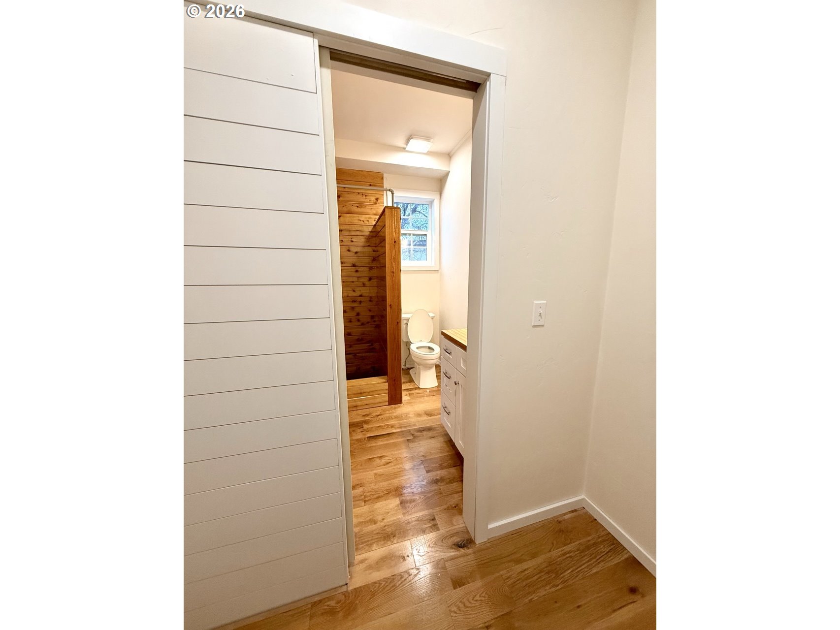 230 E Street North Powder, OR 97867 - Photo 11 of 34 a view of a hallway with wooden floor