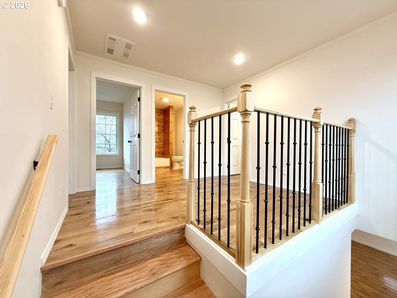 230 E Street North Powder, OR 97867 - Photo 20 of 34 a view of a hallway with wooden floor and staircase