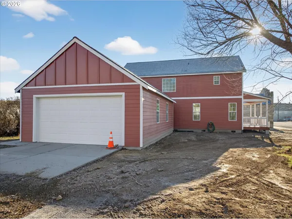 a front view of a house with yard