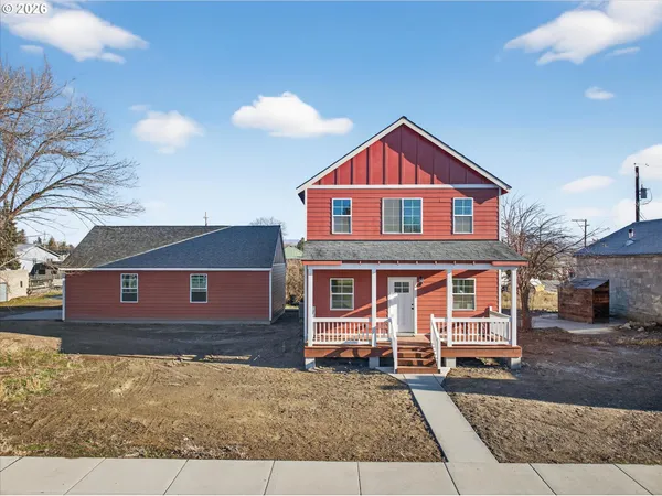 a view of a house with a garage