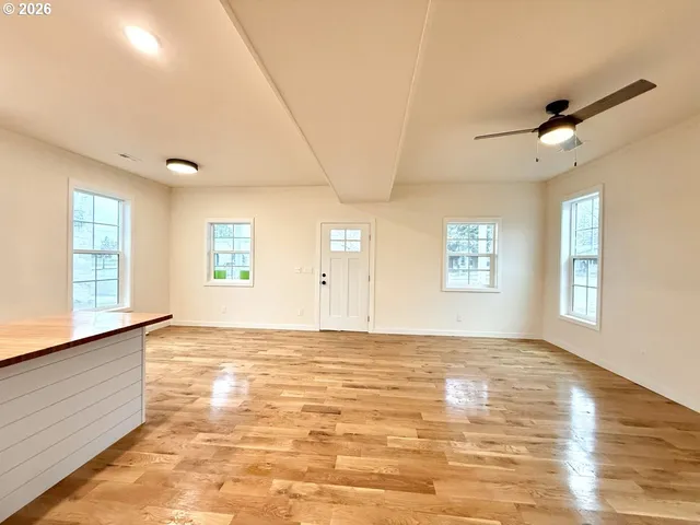 a view of an empty room with a window