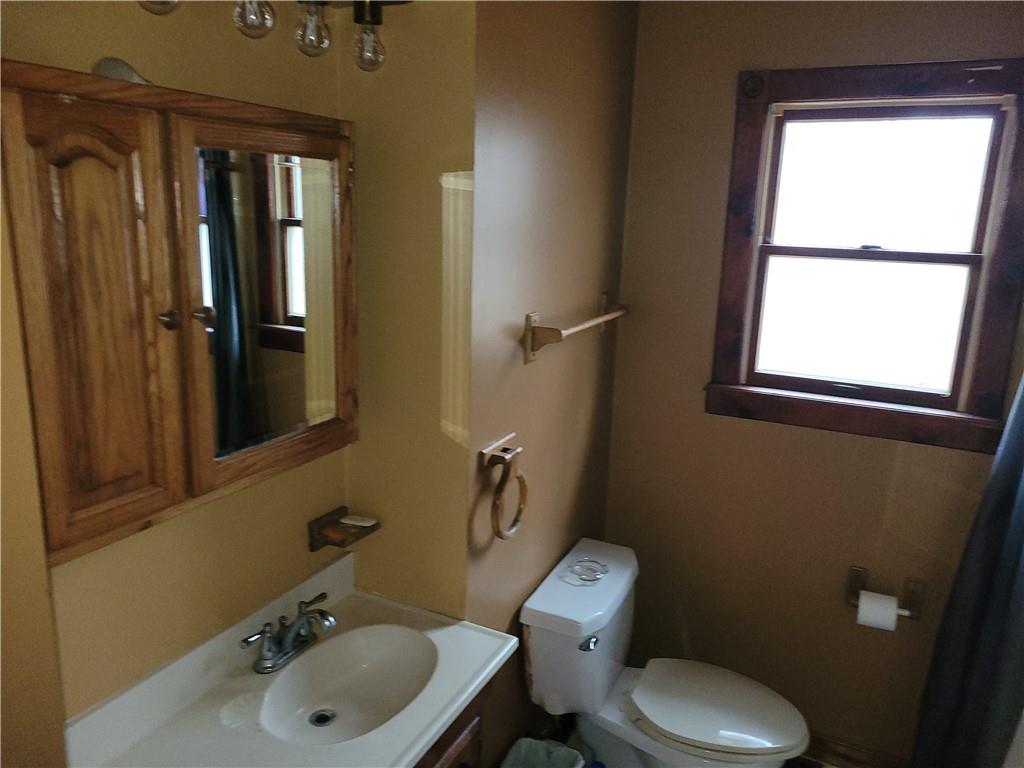 116 Willadell Road Transfer, PA 16154 - Photo 15 of 23 a bathroom with a sink toilet and mirror