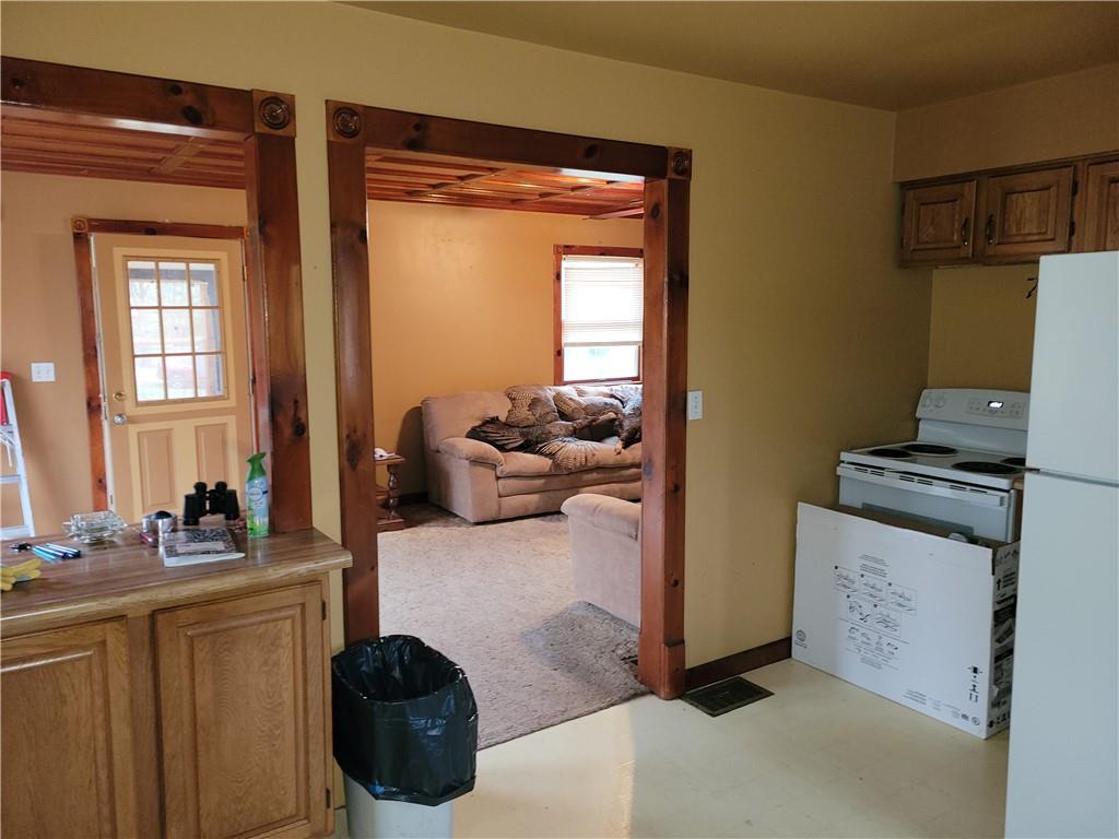 116 Willadell Road Transfer, PA 16154 - Photo 20 of 23 a living room with furniture a window and a fireplace