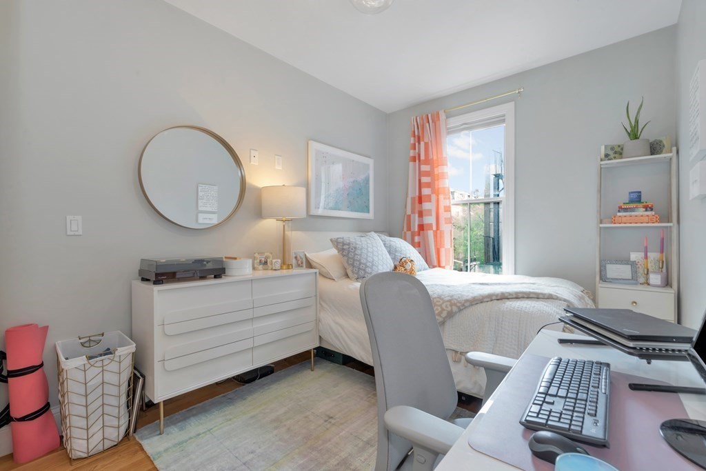 10 East Springfield Street, Unit 3 Boston, MA 02118 - Photo 16 of 26 a living room with furniture and a window